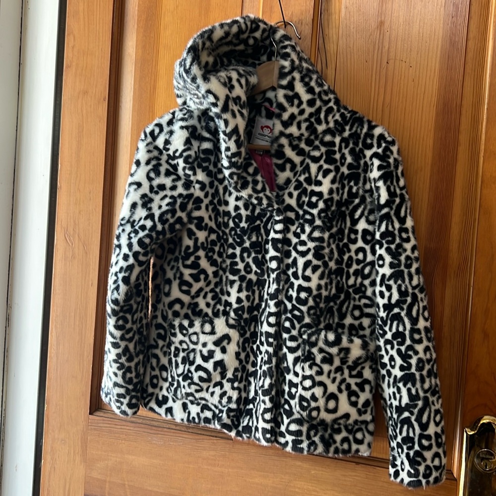 New- Appaman black and white faux fur on outside with a hot pink silk interior.!
